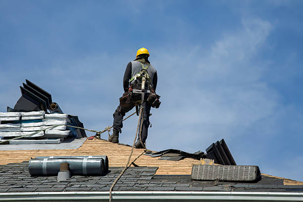 Professional Gutter Installation technician working in Huron, SD
